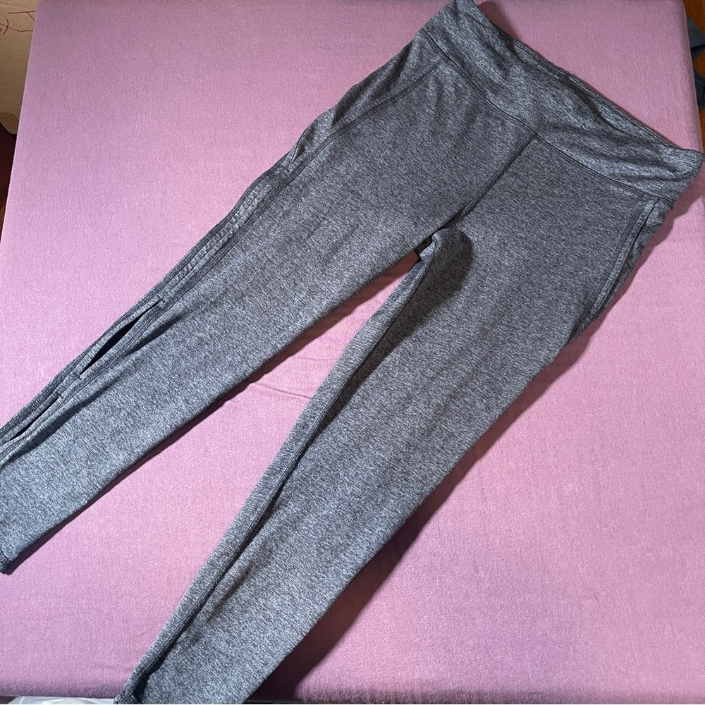 Free People FP Movement 21" Capri Leggings Gray- Size Medium Calf Cut Out Detail